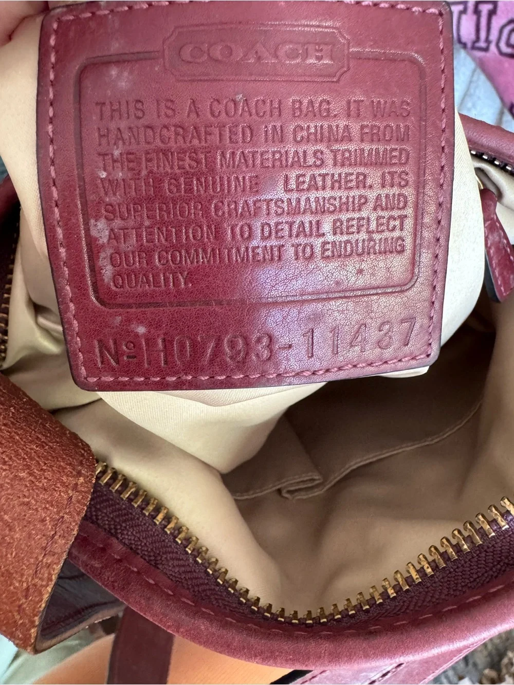 Coach Signature Canvas Bucket Bag with Burgundy Leather Trim